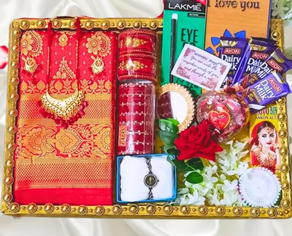 লাল কাতান শাড়ি।